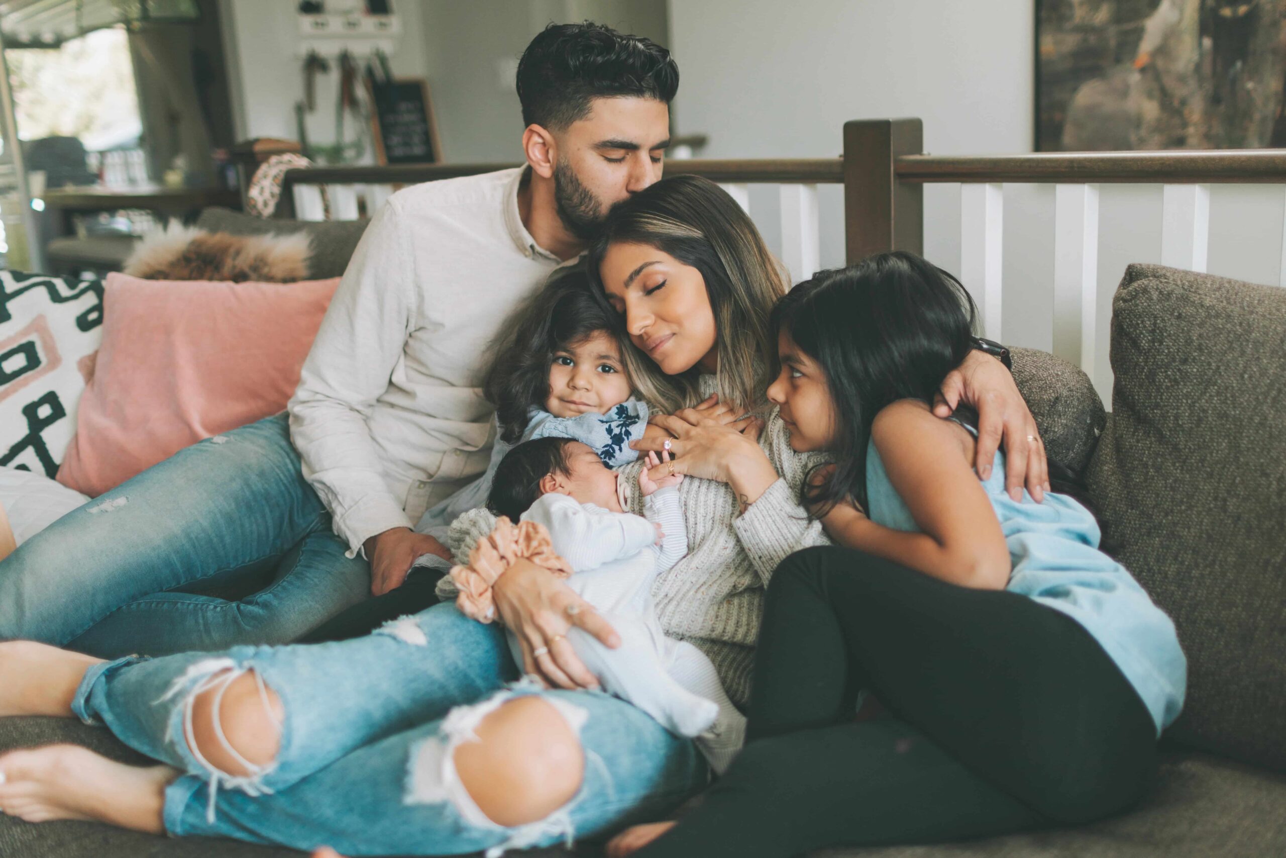 a-beautiful-indian-family-cuddling-together-on-the
